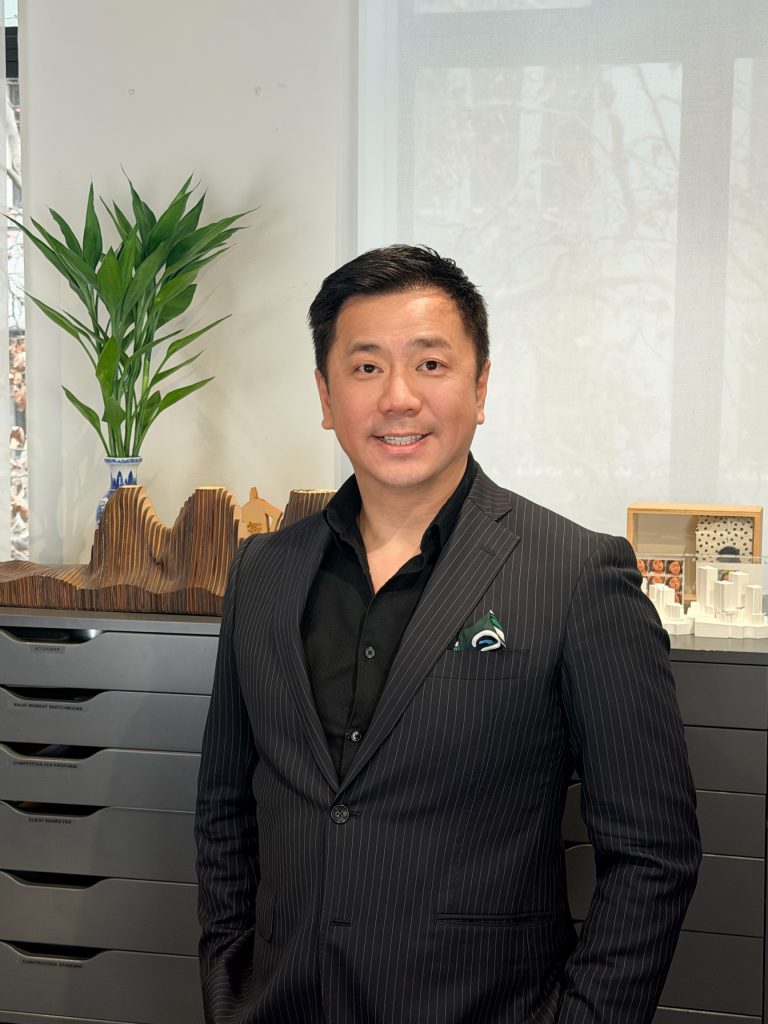 Portrait of Gordon Mar in an office setting