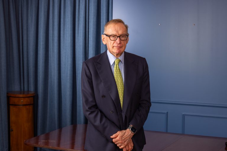 Portrait of the Hon. Bob Carr in a navy suit